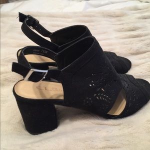 Black peep-toe sling back heels